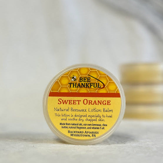 Bee Thankful Sweet Orange lotion balm container on a white background